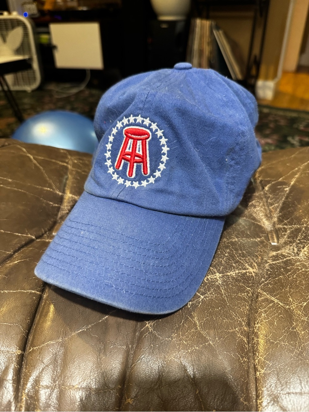 Barstool-Style Blue Adjustable Baseball Cap with Red Emblem